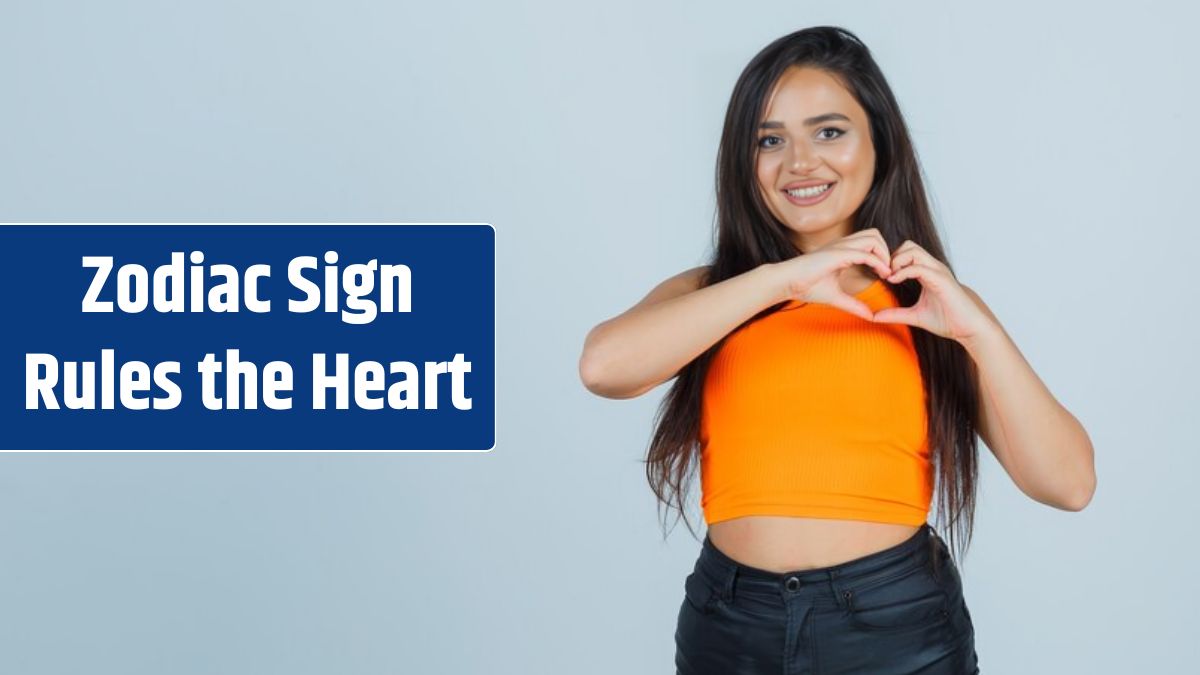 Young lady showing heart gesture in singlet, mini skirt and looking happy.