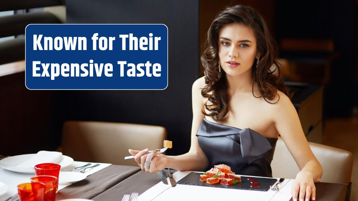 Young woman looking at camera eating a dessert in the restaurant wear elegant dress with makeup and hairstyle.