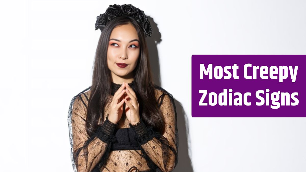 Thoughtful and cunning asian woman in witch costume prepared something for halloween, looking upper left corner and thinking. Girl wearing black gothic dress and wreath for party.