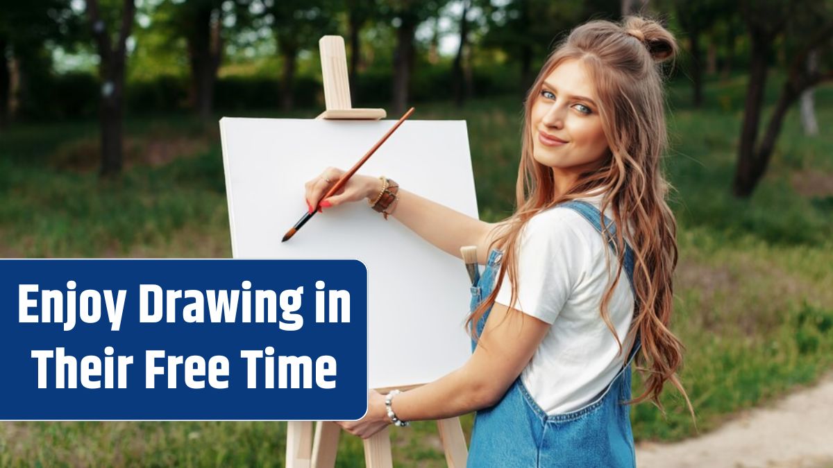 Young caucasian woman painting on canvas outside.